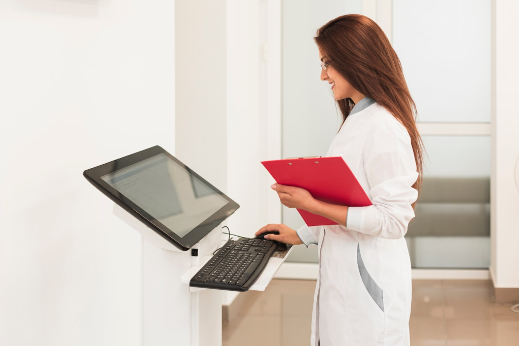 Healthcare employee using equipment