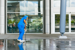 person cleaning a commercial space
